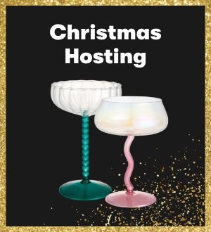 A pair of cocktail glasses with contrasting stems.