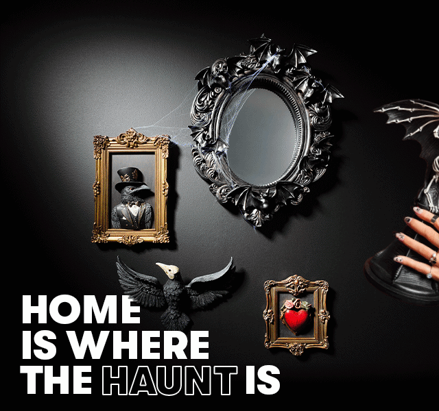 GIF of Halloween-themed wall display with gothic frames and mirror. Text reads “HOME IS WHERE THE HAUNT IS”. 
