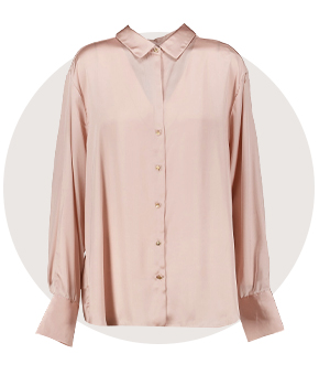 A silky peach-toned collared blouse.