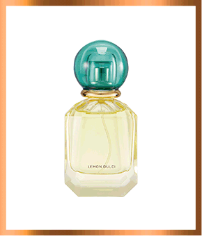 A perfume bottle with green lid