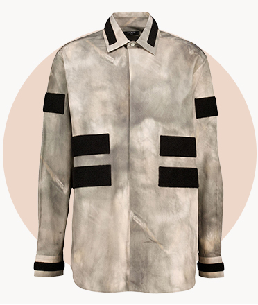 Grey button-up shirt with black stripe detailing on the sleeves and front, displayed against a beige circular background.