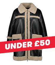 A long coat with leather panelling and shearling detailing.