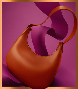 A tan leather shoulder bag.