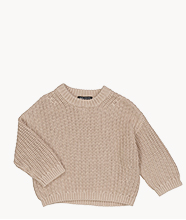 A cosy beige jumper with a baggy fit.