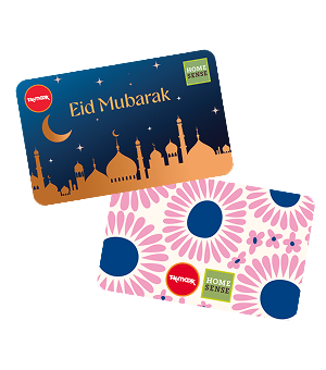 An Eid gift card alongside a floral-printed gift card.