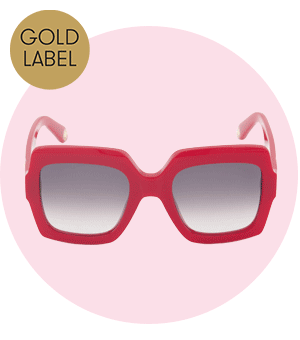  A GIF showing a selection of designer accessories including bold red sunglasses, and a camel-toned beanie. 