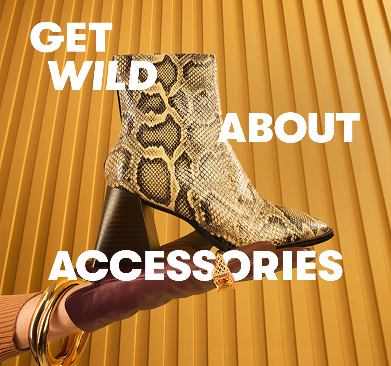 Snake-print ankle boot with the text 