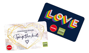 Two gift cards, one printed with the word Love and the other saying Tying the knot.