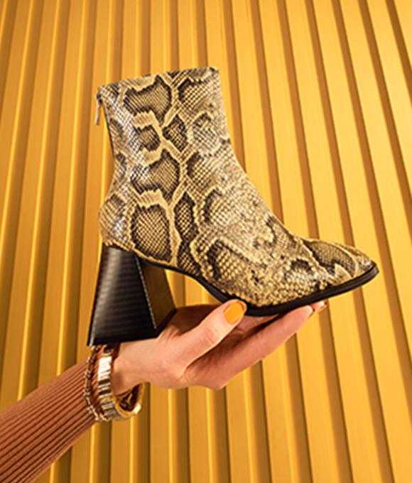 Snake skin ankle boots.
