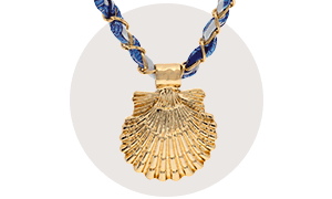 A GIF showing a gold shell necklace, blue floral earrings and a rainbow-coloured ring.