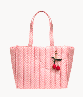 A GIF showing a selection of striped, printed and beige tote bags with contrasting bag charms. 