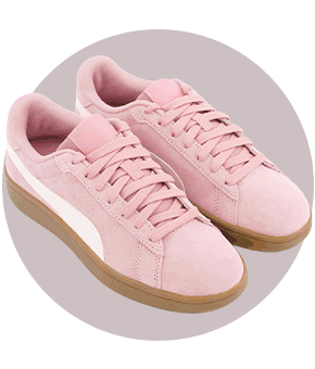 A pair of pink trainers with white accents and a tan gum sole.