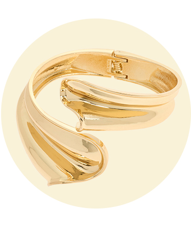 A gold wrap-around bangle.