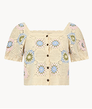 A cream crochet, short-sleeved top