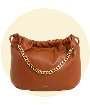 A brown leather bag with a gold chain strap.