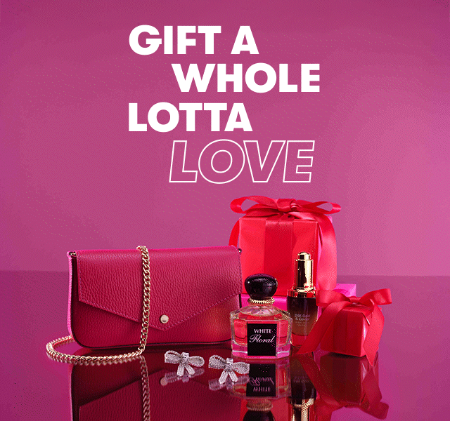 A selection of stylish gifts in pink hues, including a handbag, jewellery and perfume.