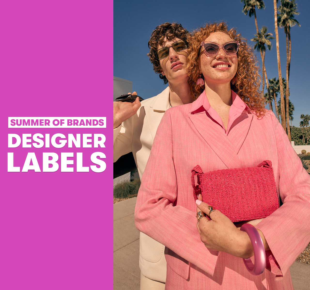 Two models in sunglasses stood outdoors with palm trees; one holds a pink clutch. Text reads “Summer of Brands. Designer Labels”.