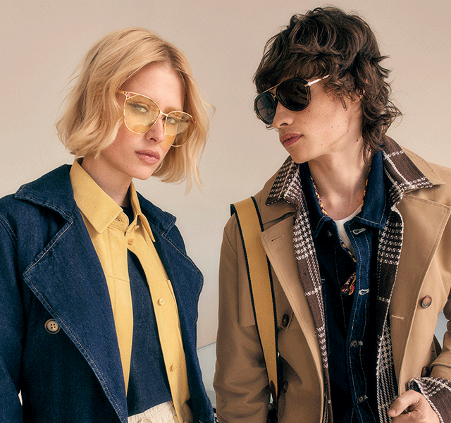 A GIF showing a male and female model wearing neutral layered pieces and statement sunnies.