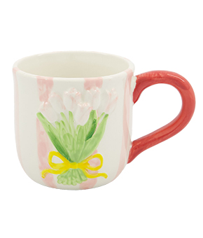 A ceramic mug painted with a bouquet of flowers.
