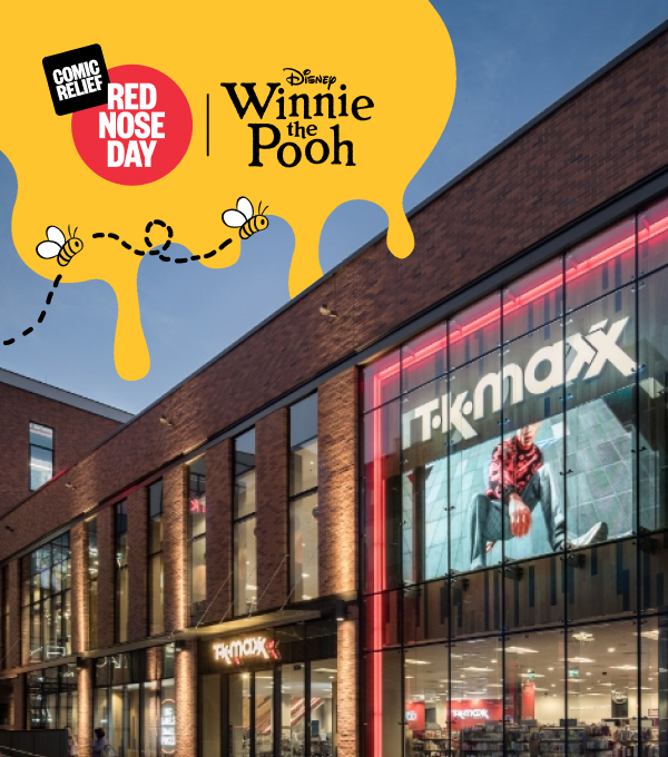 The exterior of a TK Maxx store with a Winnie the Pooh illustration 