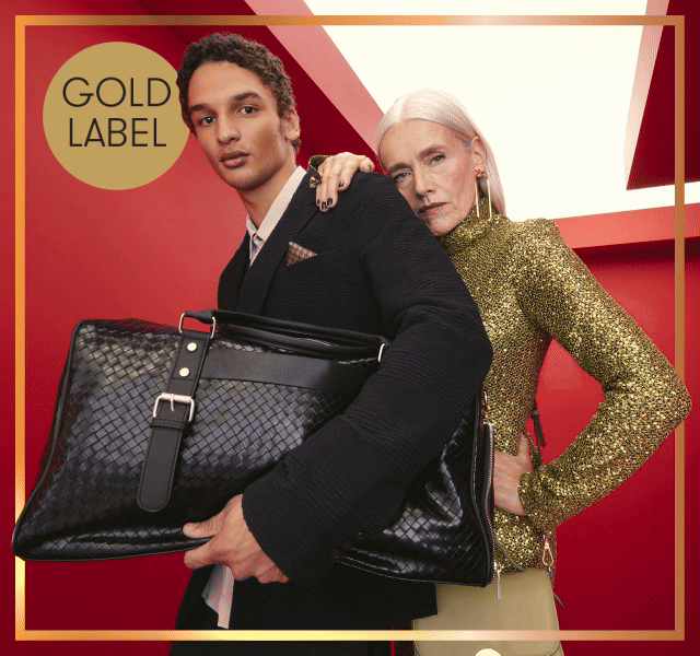 Sparkling border GIF of an image featuring a mature female model in gold sequinned clothes and a younger male model suited.