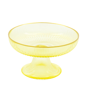 A small yellow glass serving dish. 