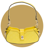 A banana-yellow leather shoulder bag with silver hardware.