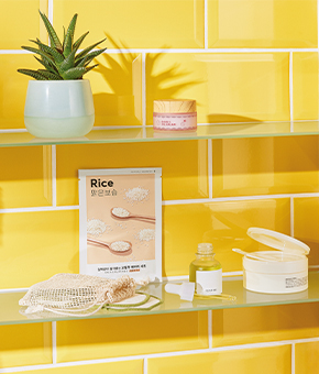 A bathroom shelf with beauty essentials.